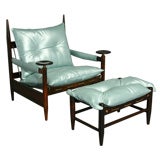 Rosewood and metallic blue leather arm chair and ottoman, Brazil