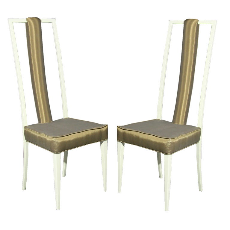 A Pair Of Tall Green Silk And White Frame Corner Chairs