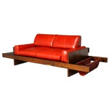 Rosewood and Red Leather Settee with Floating Ends by Celina