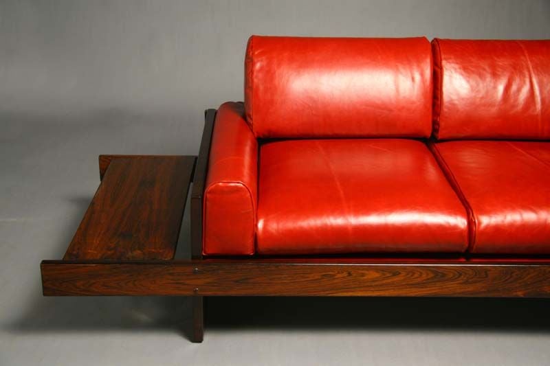 Mid-20th Century Rosewood and Red Leather Settee with Floating Ends by Celina