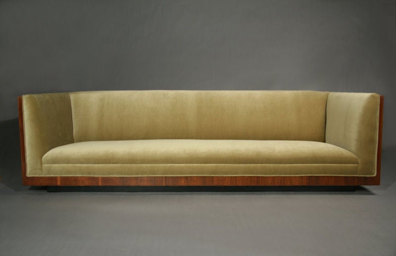 A walnut frame case sofa upholstered in light green mohair designed by Milo Baughman for Thayer-Coggin. See separate listing: Walnut and mohair case chair by Milo Baughman.