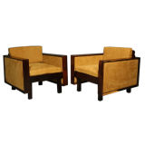 Pair of rosewood and leather arm chairs by Fatima Architects