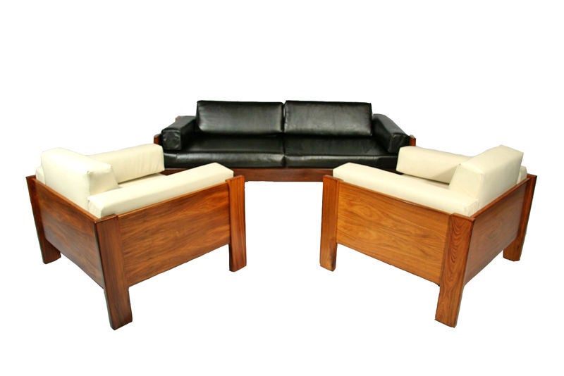 Pair of solid caviuna wood case chairs with cream leather cushions from Brazil by Jorge Zalszupin for L'Atelier. See also separate listing with matching sofa in dark brown leather.
Seat depth measures 22.5