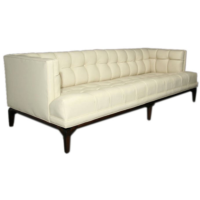 Cream button tufted leather sofa by Monteverdi-Young