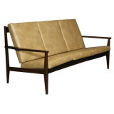Tan leather and rosewood sofa by Gelli
