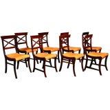A set of eight Klismos style rosewood dining chairs