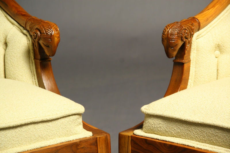 These arm chairs recall classic designs of many eras, whereby animal heads and hooves are portrayed as an integral part of the design of the chair. Seat depth measure 19