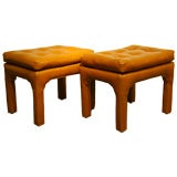 Pair of caramel leather wrapped ottomans or benches
