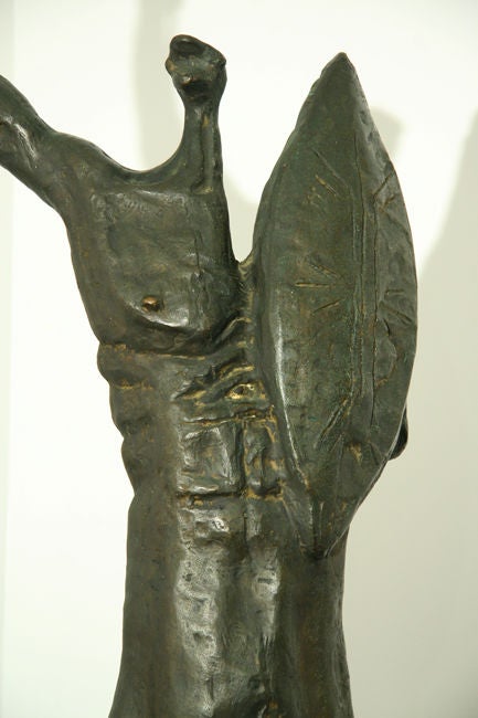 This sculpture sits upon a large plate and holds a bronze spear that is removable from the hand.  Stockinger is a very important sculptor in Brasil.  This is one of his larger works weighing in at approximately 60 lbs.

Many pieces are stored in