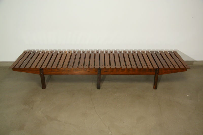 A long "Mucki" bench or coffee table by Sergio Rodrigues