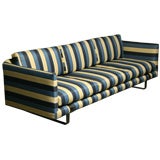 Striped fabric tuxedo sofa with thick bronze base