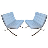 Pair of Barcelona chairs by Mies van der Rohe