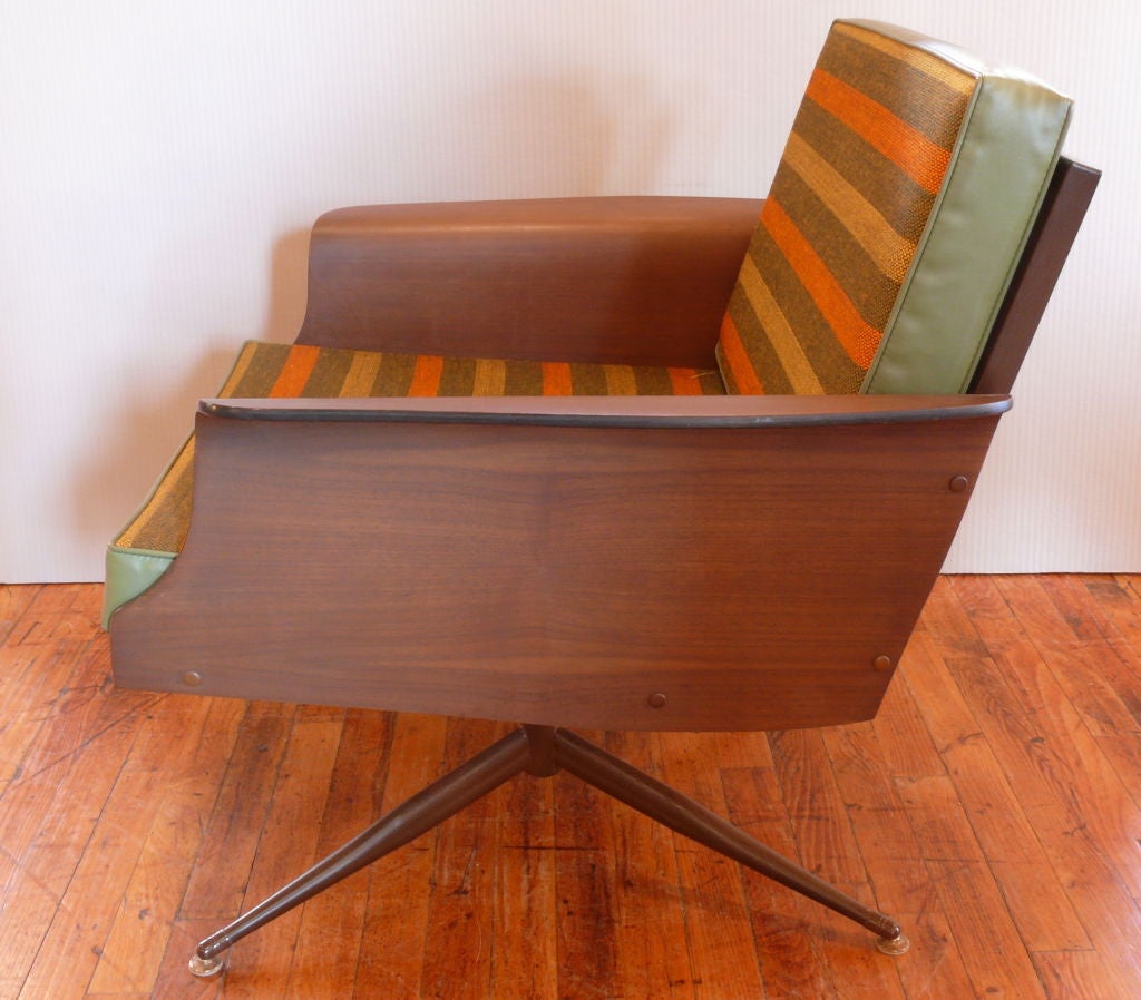 Pair of dead stock chairs by Baumritter.  Original tags on and intact.<br />
These chairs have never been used.  Amazing wood grain effect that Baumritter created and original striped cushions.