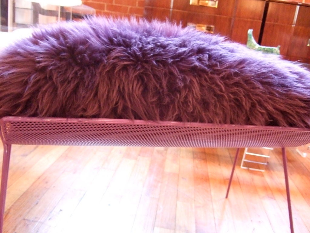 American PAIR of purple shearling ottomans