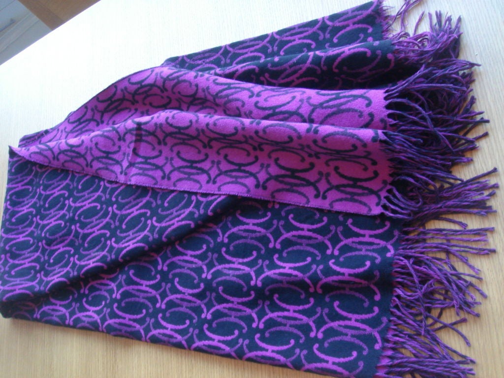 A purple faced and black backed Hermes Blanket with the classic Hermes loop design,