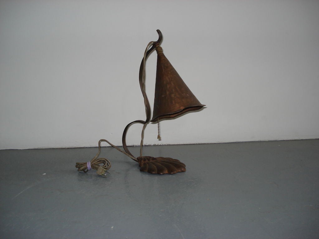 A unique Mission style lamp forged of copper.