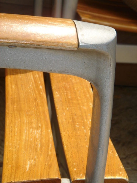 Contemporary A long Free-form Ipe Wood Slab Table and Twelve chairs