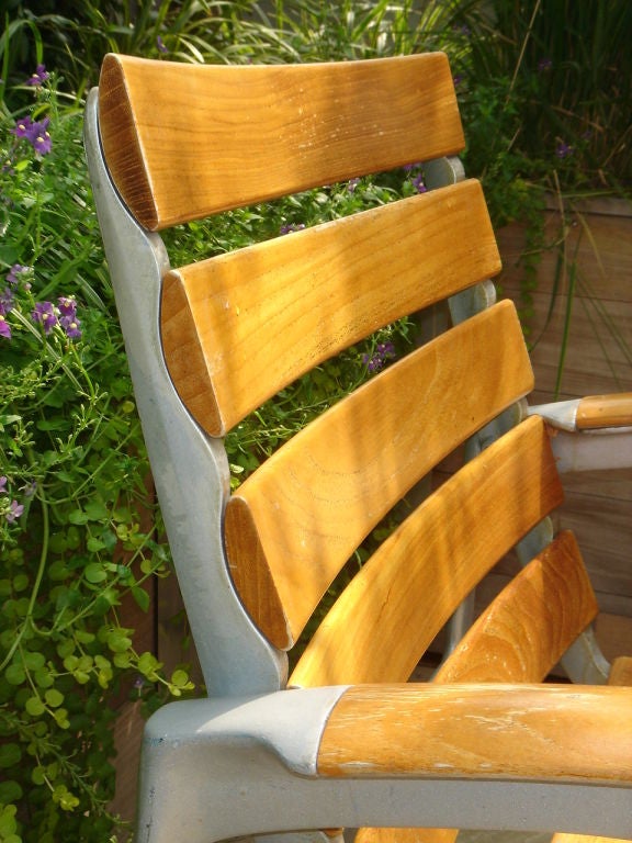Aluminum A long Free-form Ipe Wood Slab Table and Twelve chairs
