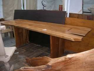 A long Free-form Ipe Wood Slab Table and Twelve chairs 3