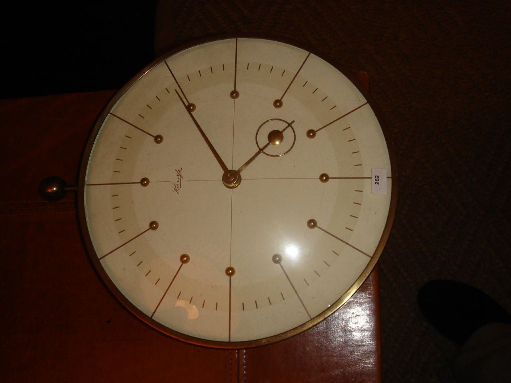 A Wall Clock by Heinrich Möller circa 1935. Made by Kienzle, Schwenningen. Marked: Kienzle.