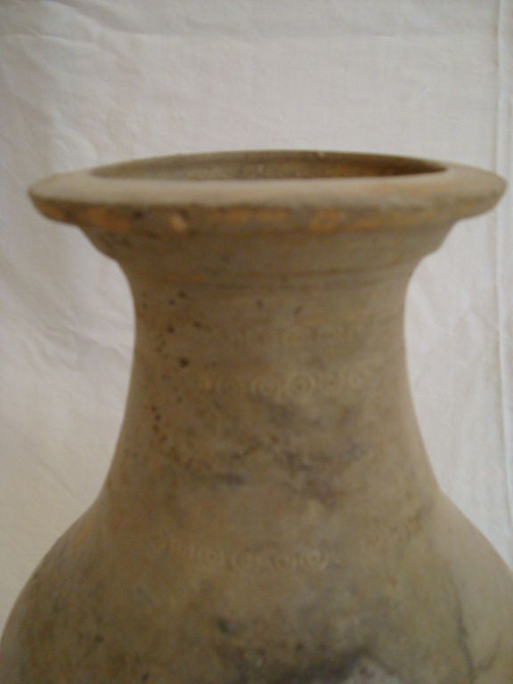 A well formed Han vase with a double rim line, with a wide angled base.

Would make an excellent lamp base with a drop-in light.
