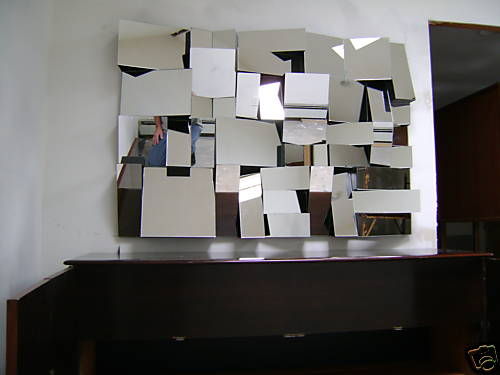 An Impressive Facetted Mirror by Neal Small For Sale