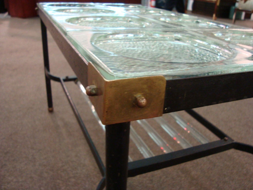 A Glass and Metal Coffee Table by Jacques Adnet