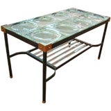 A Glass and Metal Coffee Table by Jacques Adnet