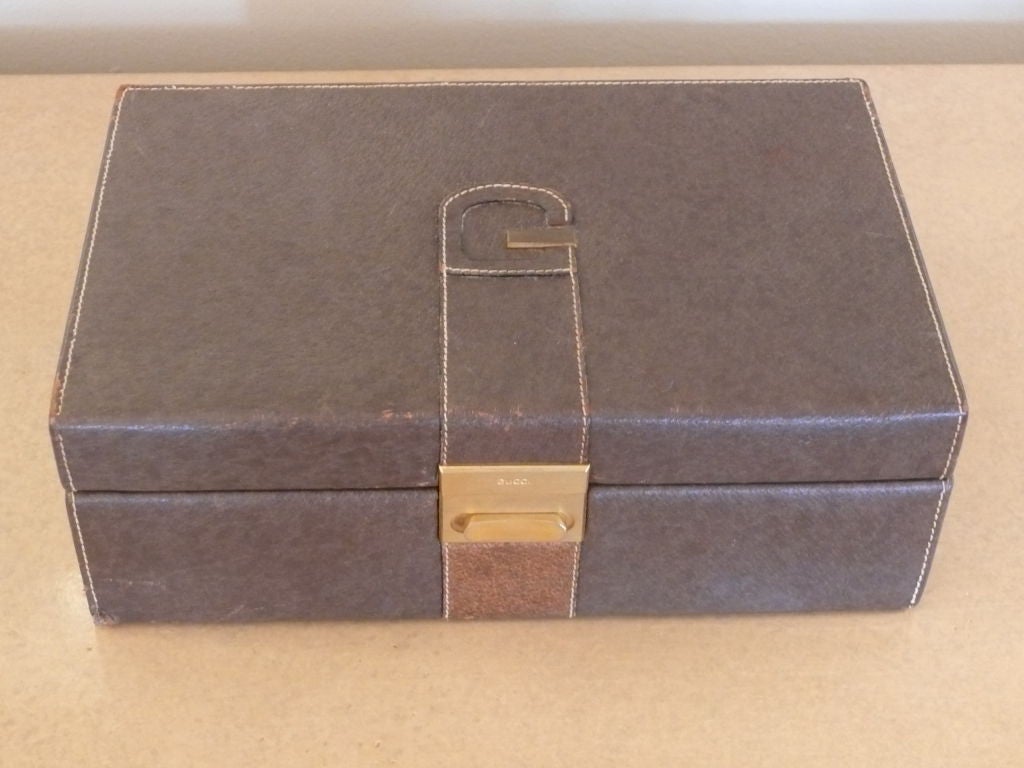 Original vintage leather Gucci jewelry box with brass clasp. Original stamp on the bottom with great storage for jewels inside!