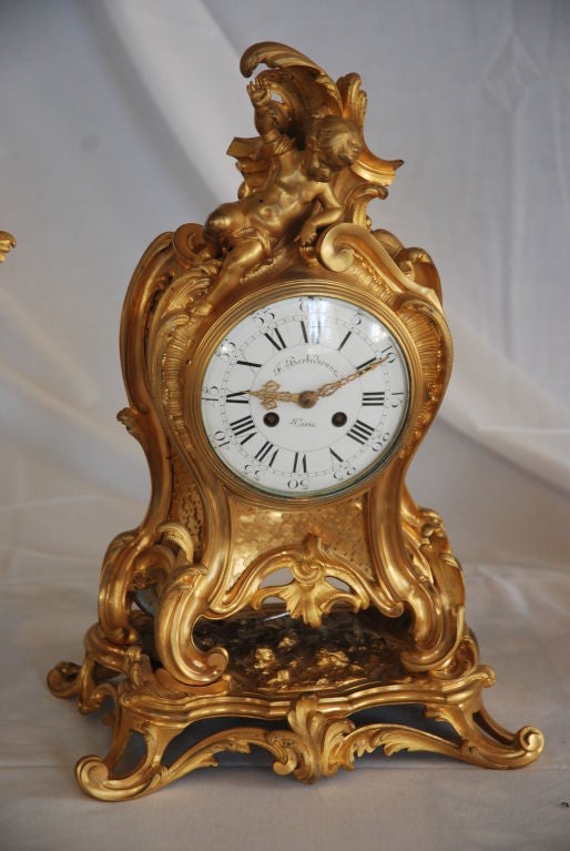 19th century Clock and pair of Candleabra