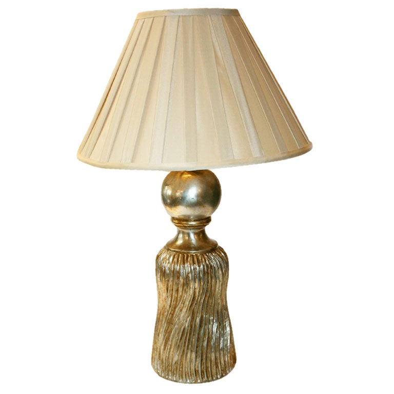 A FANCIFUL GILTWOOD TASSEL LAMP For Sale
