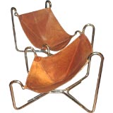 Antique leather sling chairs