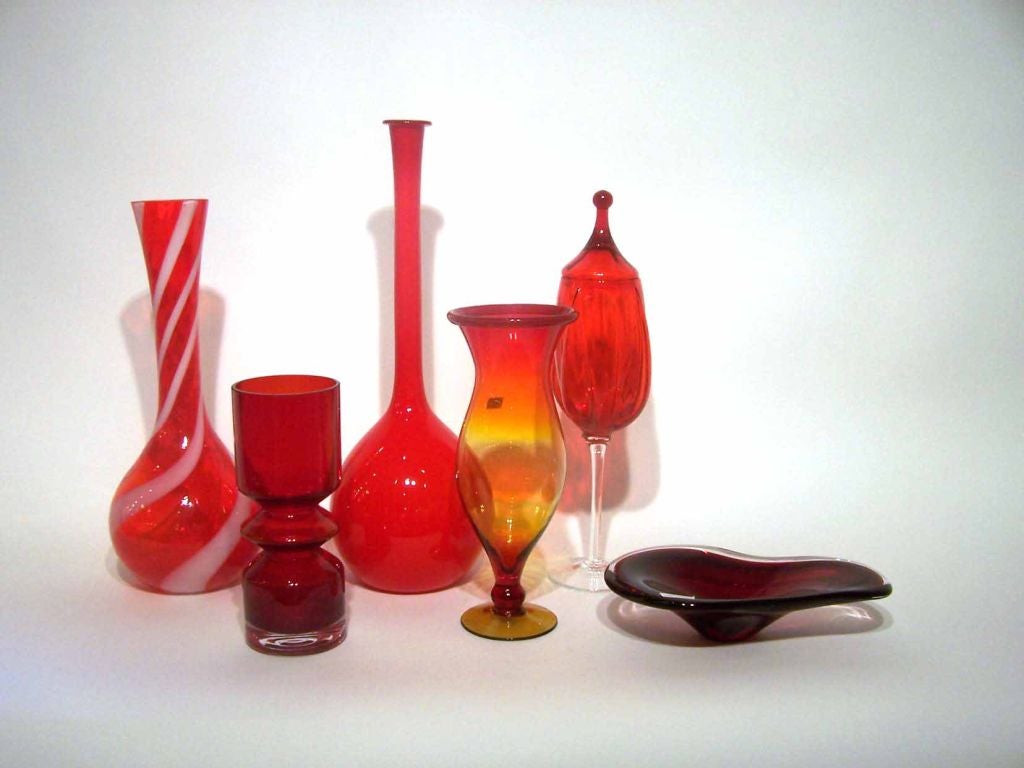 Collection of red (various shades) mid-century glass including <br />
 American, Scandinavian,  & Italian manufacturers. Prices and dimensions vary, please inquire (price below is for the low bowl). Please see our other collections of glass.