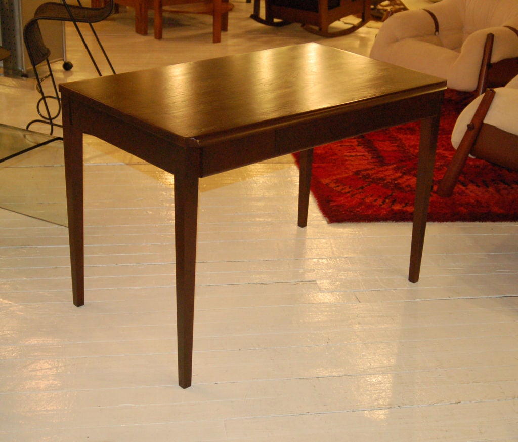 Desk by Thomas Newhouse for Herman Miller.  Single drawer, award winning design, tapered leg, no longer in production.***Contact/Shipping Information: AOL (American Online) users may experience difficulties sending emails to us or receiving emails