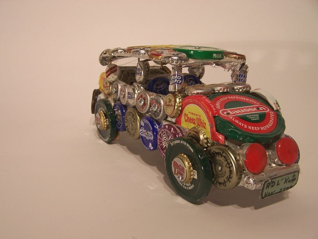 Outsider art / folk art piece by Richard Kopp.  The car was created and is on the cover of the childrens book Atlanta Bound.  ***Contact/Shipping Information: AOL (American Online) users may experience difficulties sending emails to us or receiving