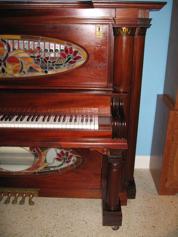 Superb Ragtime Nickelodeon player piano, retrofitted by the Ragtime Corporation of California. Utilizing a Leonard Piano Company of Philadelphia upright player piano from 1907,this instrument was converted to a nickelodeon in the 1990's, and sold by