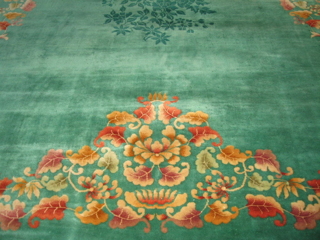Fantastic emerald green Nichols Chinese art deco rug, dating to the 1930's.  Made of 100% virgin wool, this carpet measures 10x14, and still has an even, thick pile, without any appreciable wear, no fading or odors. Just cleaned professionally,