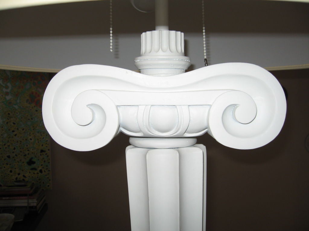 Super pair of Ionic columnar form floor lamps designed by Diamond & Baratta for a later renovation of the fabled Eden Rock Hotel in Miami Beach. Made of cast fiberglass and wood each lamp has a center, as well as two pull chain sockets, and come