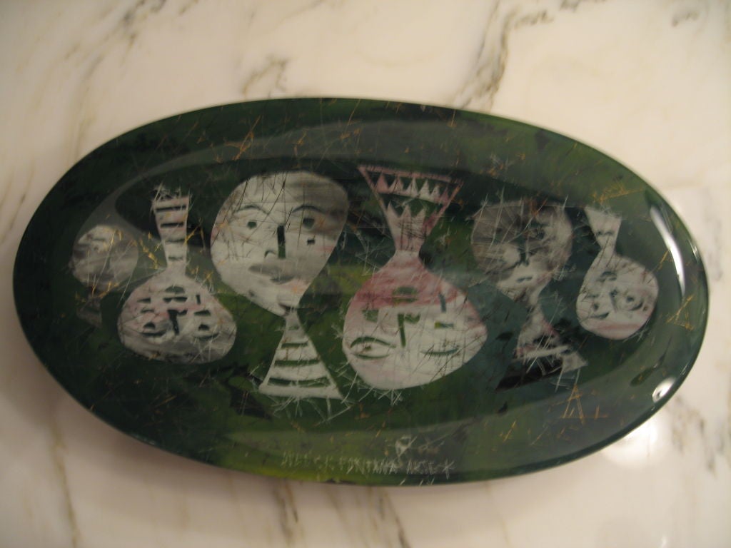 Superb 1950's vintage Fontana Arte bowl by Dube(aka Duilio Barnabe).  Reverse decorated design of human/alien heads artistically arranged.  Base is solid brass, stamped signed 