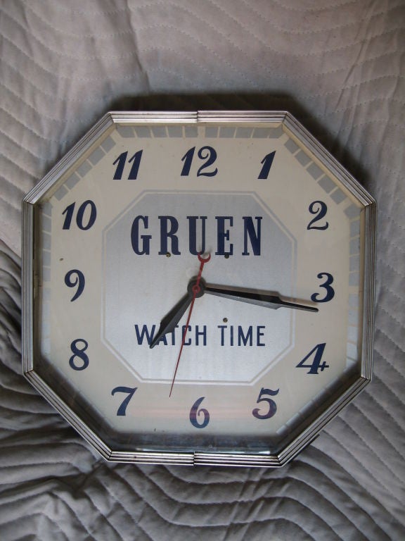 Superb find in superb working condition, this clock was used to advertise Gruen watches. Removed from it's original location, a midwest jewelry store dating to the 1930's. Original cord and quiet movement keeps clock running well. Superb item for