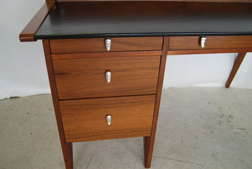 Wonderful desk manufactured in 1955 by Drexel and designed by John  Van Koert. Great scale.Four drawers and an additional mail and letter organizer.  Expertly refinished.