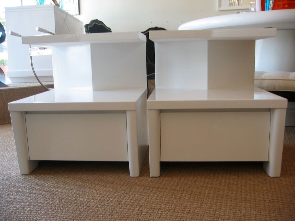 Pair of White Lacquered Two Tiered Night Stands