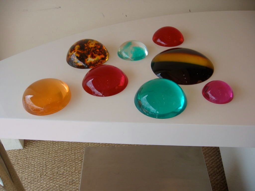 Eight Resin Paperweights/Sculptures by Norman Mercer 1