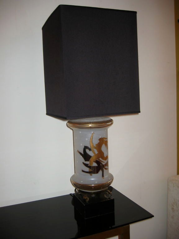 Frosted glass lamp with silver and gold painted image of Greek Goddess Diana. Original black wood base with brass detail. Shade sold separately.