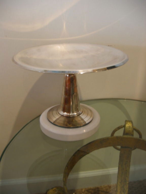 This French Art Deco silver plate pedestal dish or bowl with high gloss white lacquer disk base is great for a console or serving. The wood was redone from the walnut color. This is vintage from the 1930s and was purchased in Paris 25 years ago.