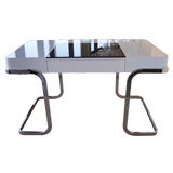 A High Gloss White Lacquered 
Chrome Desk