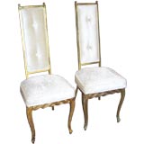 An Elegant Pair of High-back Gilded Metal Chairs
