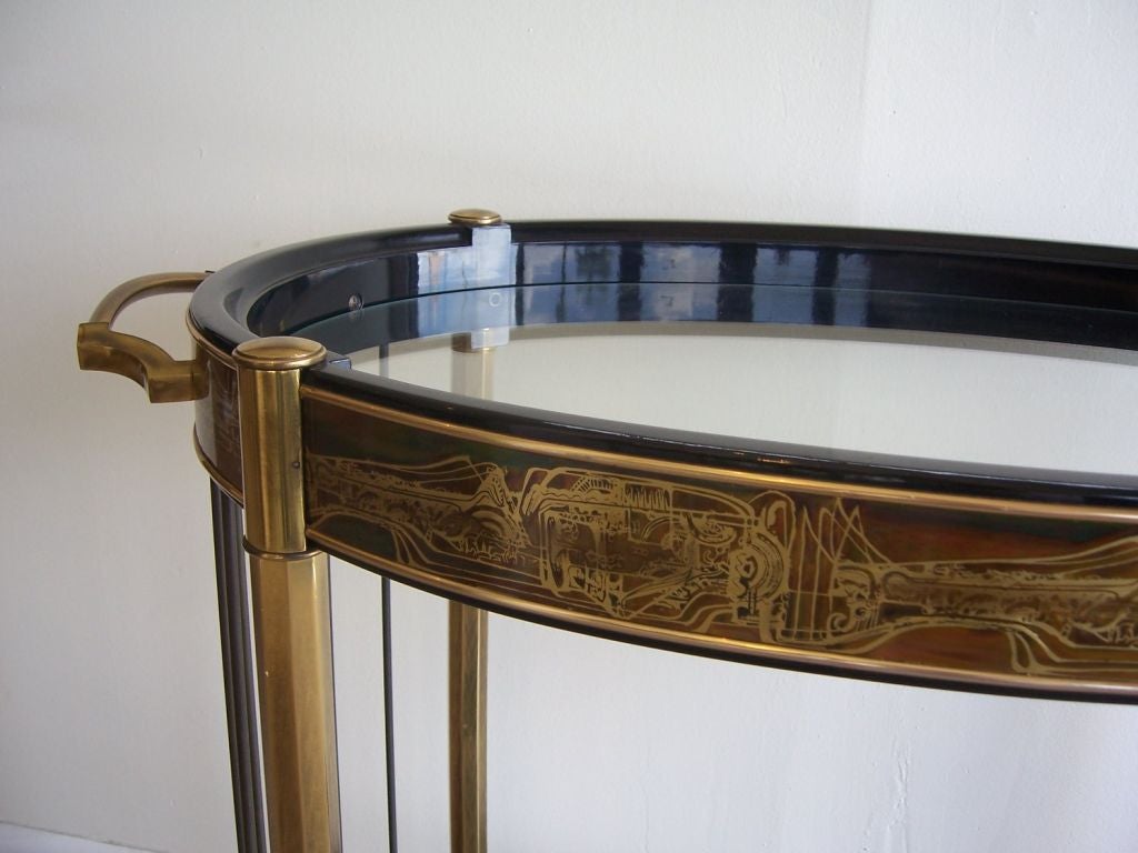 A Mastercraft Oval Rolling Bar Cart