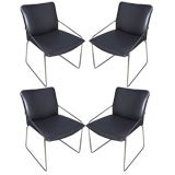A Set of Four Wire Metal Frame Chairs