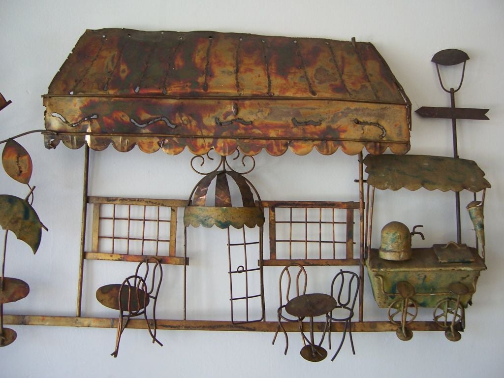 Incredible patina in this Paris cafe scene wall sculpture by C. Jere, complete with trees, cafe hut and tables/chairs.